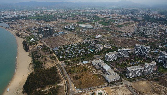 (200410) -- SANYA, April 10, 2020 (Xinhua) -- Aerial photo taken on April 9, 2020 shows the construction site of Yazhou Bay Science and Technology City in Sanya, south China\