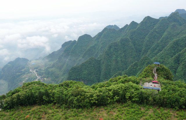 (200517) -- XIUSHAN, May 17, 2020 (Xinhua) -- Aerial photo taken on May 17, 2020 shows a view of Chuanhegai scenic spot in Tujia-Miao Autonomous County of Xiushan in southwest China\