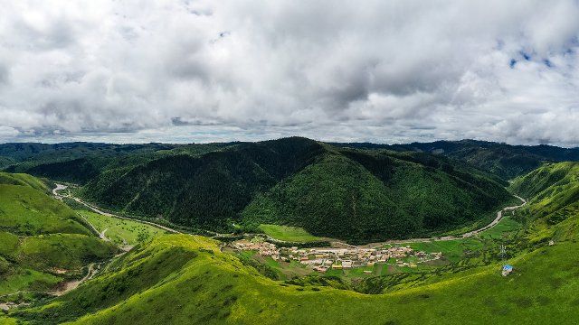 (200616) -- ABA, June 16, 2020 (Xinhua) -- Aerial photo taken on June 15, 2020 shows Shenzuo Village lying in the Shenzuo scenic area in Aba County of Aba Tibetan and Qiang Autonomous Prefecture, southwest China\
