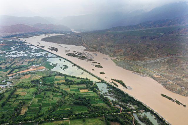 (200808) -- XINING, Aug. 8, 2020 (Xinhua) -- Aerial photo taken on Aug. 7, 2020 shows the Guide section in the upper stream of the Yellow River in northwest China\