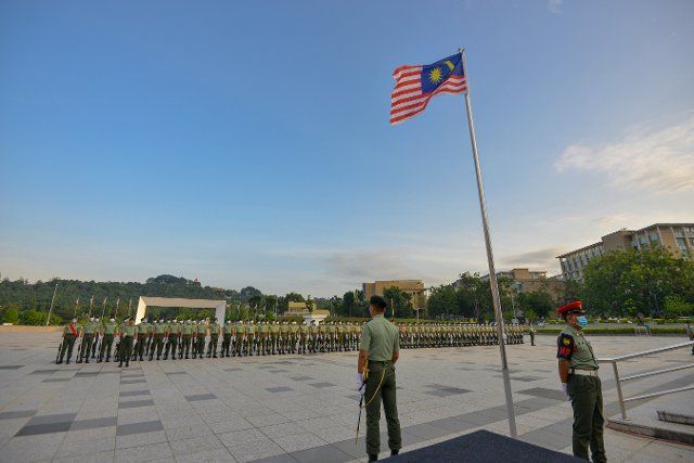 (200828) -- PUTRAJAYA , Aug. 28, 2020 (Xinhua) -- An honor guard participates in the National Day rehearsal in Putrajaya, Malaysia, Aug. 28, 2020. Malaysia will celebrate its National Day on Aug. 31. (Photo by Chong Voon Chung\/Xinhua