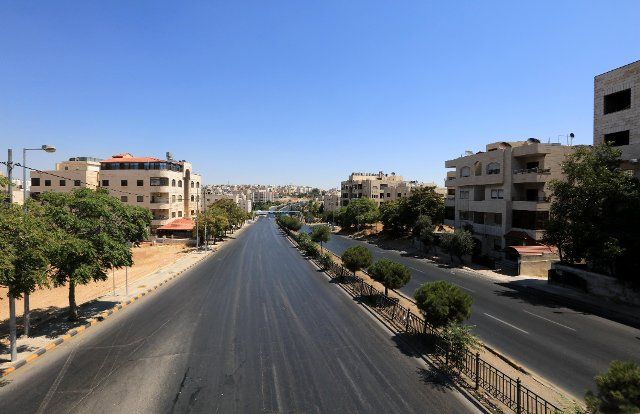(200828) -- AMMAN, Aug. 28, 2020 (Xinhua) -- Empty streets are pictured during a curfew in Amman, Jordan, Aug. 28, 2020. Jordan imposed a full curfew on Friday in Amman and Zarqa after a hike in the number of coronavirus cases. (Photo by Mohammad Abu Ghosh\/Xinhua