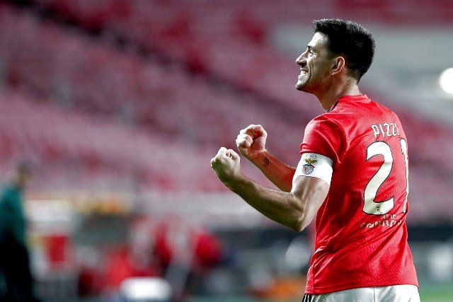 (201030) -- LISBON, Oct. 30, 2020 (Xinhua) -- Pizzi of Benfica celebrates after scoring a goal during the UEFA Europa League Group D football match between Benfica and Standard Liege at the Luz stadium in Lisbon, Portugal on Oct. 29, 2020. (Photo by Pedro Fiuza\/Xinhua