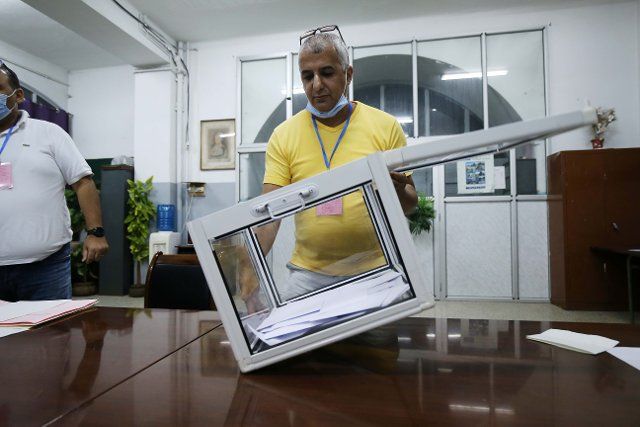(201101) -- ALGIERS, Nov. 1, 2020 (Xinhua) -- A staff member counts votes at a counting station in Algiers, Algeria, on Nov. 1, 2020. The voting for amended constitution in Algeria has finished, as the vote counting has started. (Xinhua
