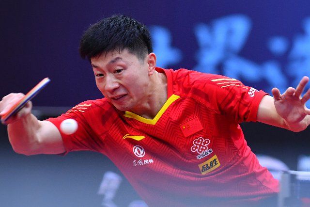 (201114) -- WEIHAI(SHANDONG), Nov. 14, 2020 (Xinhua) -- Ma Long of China returns the ball during the men\