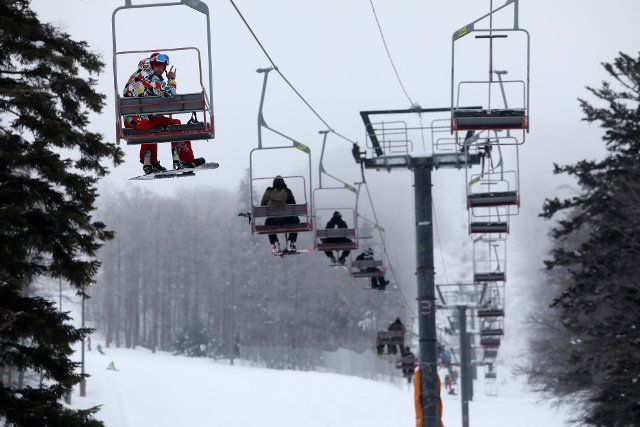 (210117) -- RIJEKA, Jan. 17, 2021 (Xinhua) -- Skiers use ski lifts at Platak ski resort near Rijeka, Croatia, Jan. 16, 2021. (Goran Kovacic\/Pixsell via Xinhua