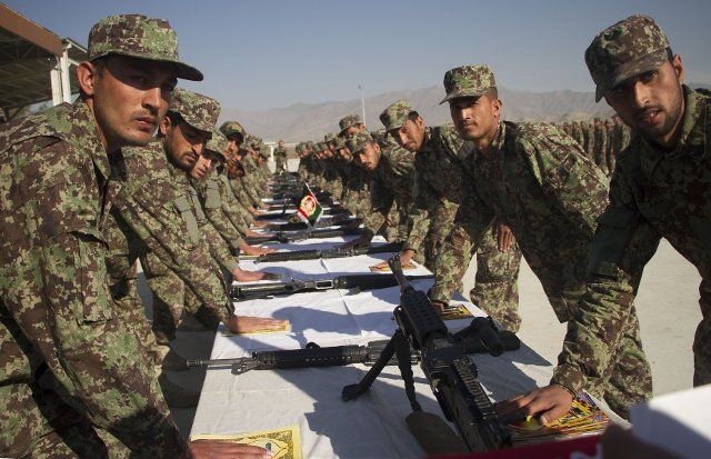 (210117) -- MEHTARLAM, Jan. 17, 2021 (Xinhua) -- Afghan army soldiers take part in their graduation ceremony in Qarghayi district of Laghman province, Afghanistan, Jan. 17, 2021. A total of 435 soldiers graduated from an Afghan military training center and were commissioned to the army on Sunday, a military source said. (Photo by Saifurhman Safi\/Xinhua