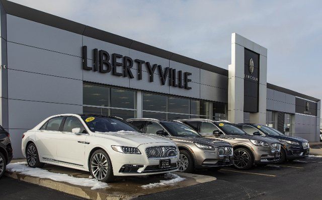(210106) -- LIBERTYVILLE (U.S.), Jan. 6, 2021 (Xinhua) -- Vehicles are seen at a Ford Lincoln dealership in Libertyville, Illinois, the United States, on Jan. 6, 2021. Ford Motor Co. announced on its website on Wednesday that it sold 2.04 million new vehicles in the United States in 2020, down 15.6 percent from 2.42 million sold in 2019. (Photo by Joel Lerner\/Xinhua