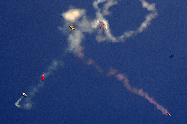 (210306) -- ISLAMABAD, March 6, 2021 (Xinhua) -- Photo taken on March 5, 2021 shows paragliders performing during the Islamabad Tourism Festival in Islamabad, capital of Pakistan. The three-day Islamabad Tourism Festival kicked off in Pakistan\