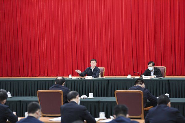 (210317) -- BEIJING, March 17, 2021 (Xinhua) -- Chinese Vice Premier Han Zheng, also a member of the Standing Committee of the Political Bureau of the Communist Party of China Central Committee, attends a symposium at the National Development and Reform Commission in Beijing, capital of China, March 16, 2021. (Xinhua\/Yin Bogu