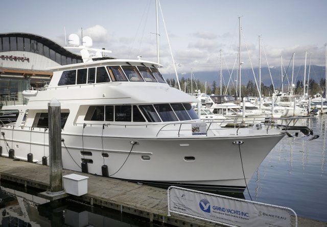 (210224) -- VANCOUVER, Feb. 24, 2021 (Xinhua) -- A cruiser boat for display during the 2021 Vancouver International Boat Show is seen at a harbour in Vancouver, British Columbia, Canada, Feb. 24, 2021. The Vancouver International Boat Show which goes virtual this year due to the COVID-19 pandemic, kicked off on Wednesday, showcasing hundreds of new boats, products and accessories online. (Photo by Liang Sen\/Xinhua