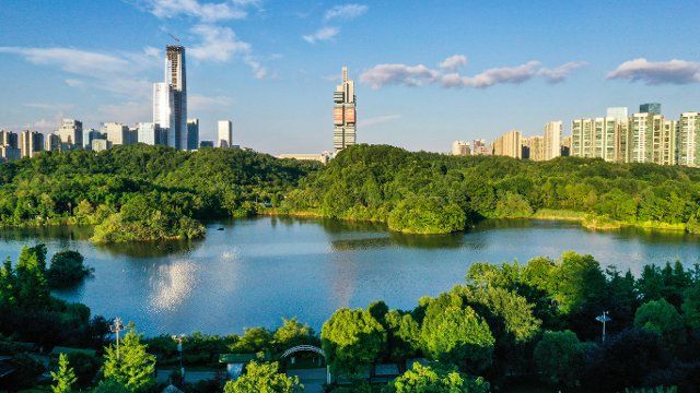(210712) -- GUIYANG, July 12, 2021 (Xinhua) -- Aerial photo taken on July 7, 2021 shows the scenery of Guanshanhu Park in Guiyang City, southwest China\