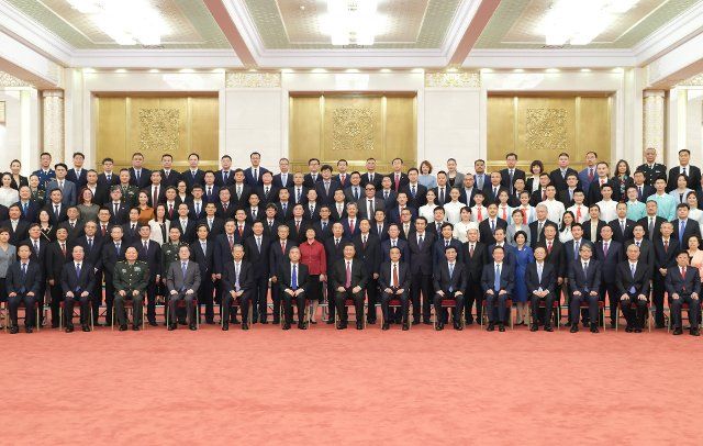 (210713) -- BEIJING, July 13, 2021 (Xinhua) -- Leaders of the Communist Party of China (CPC) and the state Xi Jinping, Li Keqiang, Wang Yang, Wang Huning, Zhao Leji and Han Zheng meet with representatives of all who have participated in the preparations for the CPC centenary celebrations, in Beijing, capital of China, July 13, 2021. (Xinhua\/Yin Bogu