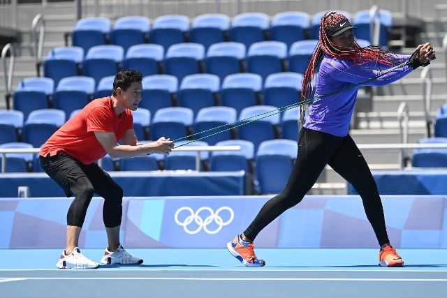(210720) -- TOKYO, July 20, 2021 (Xinhua) -- Osaka Naomi (R) of Japan attends a training session prior to the Tokyo 2020 Olympic Games at Ariake Tennis Park in Tokyo, Japan, July 20, 2021. (Xinhua\/Dai Tianfang