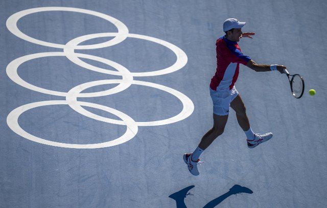 (210724) -- TOKYO, July 24, 2021 (Xinhua) -- Novak Djokovic of Serbia hits a return during the tennis men\