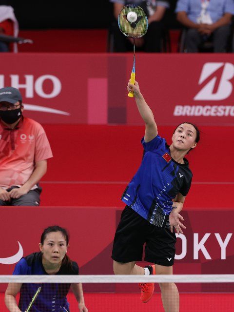 (210904) -- TOKYO, Sept. 4, 2021 (Xinhua) -- Cheng Hefang (R)\/Ma Huihui of China compete during the badminton women\