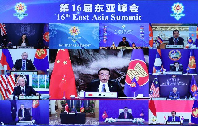 (211028) -- BEIJING, Oct. 28, 2021 (Xinhua) -- Chinese Premier Li Keqiang attends the 16th East Asia Summit via video link at the Great Hall of the People in Beijing, capital of China, Oct. 27, 2021 (Xinhua\/Yao Dawei