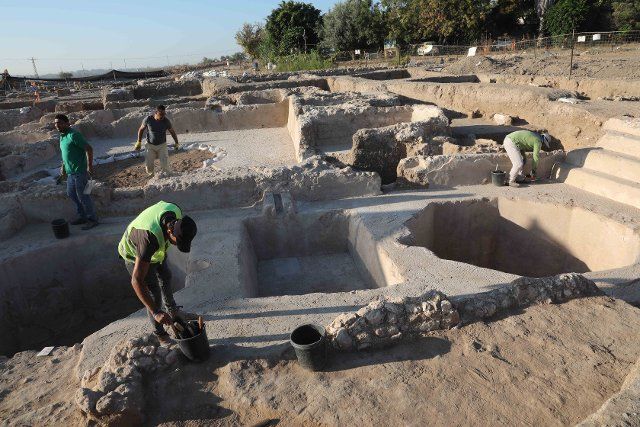 (211011) -- YAVNE, Oct. 11, 2021 (Xinhua) -- Workers operate at the excavation site of an ancient wine factory in Yavne of central Israel, on Oct. 11, 2021. Israeli archaeologists have exposed a 1,500-year-old massive wine factory, the Israel Antiquities Authority (IAA) said Monday. The huge and well-designed industrial estate from the Byzantine period has been excavated over the past two years in the city of Yavne in central Israel. (Photo by Gil Cohen Magen\/Xinhua