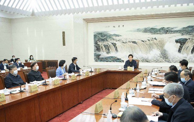(211015) -- BEIJING, Oct. 15, 2021 (Xinhua) -- Senior Chinese legislators meet to study an important speech delivered by Xi Jinping, general secretary of the Communist Party of China (CPC) Central Committee, at a central conference on work related to people\