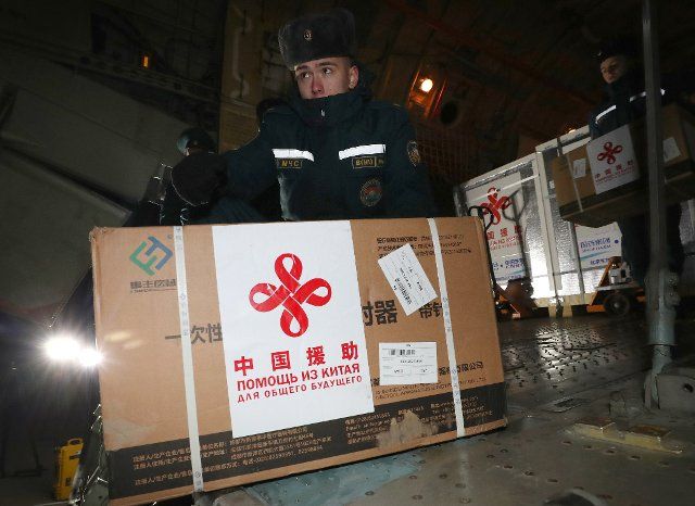 (211112) -- MINSK, Nov. 12, 2021 (Xinhua) -- Chinese vaccines and medical supplies are unloaded from a plane at an airport in Minsk, Belarus, Nov. 11, 2021. China and Belarus signed a document on vaccine transfer after a new batch of coronavirus vaccines from China arrived here Thursday. (Photo by Henadz Zhinkov\/Xinhua