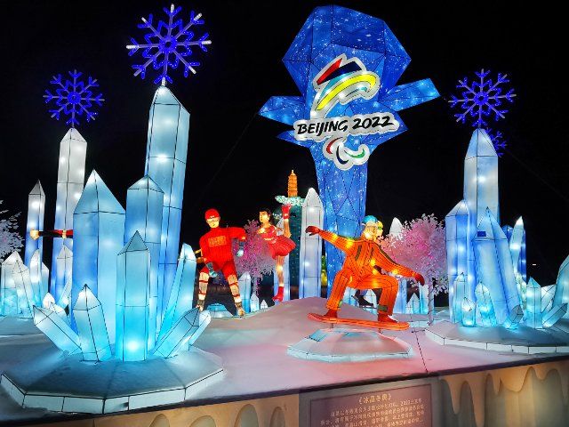 (211229) -- LAIYUAN, Dec. 29, 2021 (Xinhua) -- Colorful lanterns themed on winter sports are displayed at Binhu Park in Laiyuan County, north China\