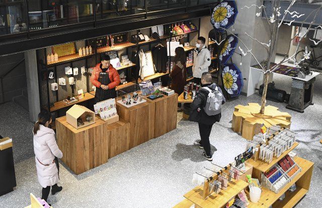 (211221) -- CHONGQING, Dec. 21, 2021 (Xinhua) -- Photo taken on Dec. 21, 2021 shows a store selling creative cultural products at a steel mill-turned industrial museum in southwest China\