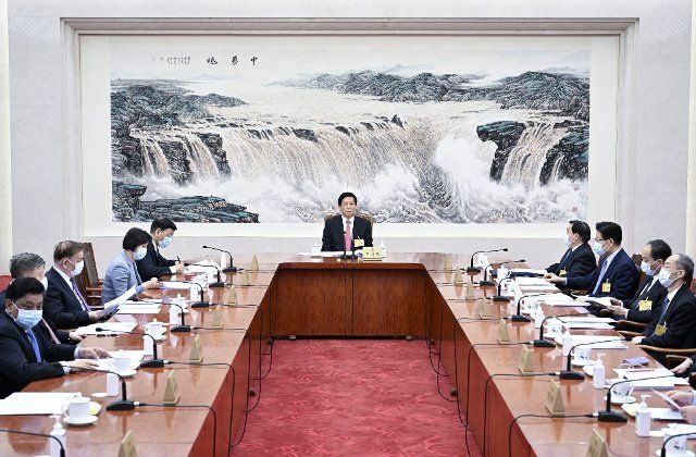 (220227) -- BEIJING, Feb. 27, 2022 (Xinhua) -- Li Zhanshu, chairman of the National People\