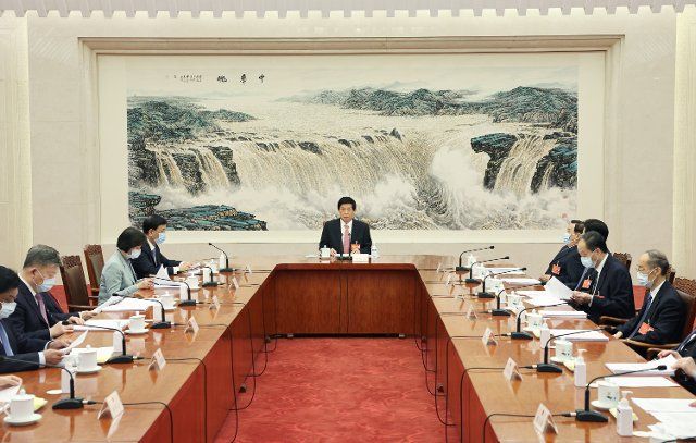 (220308) -- BEIJING, March 8, 2022 (Xinhua) -- Li Zhanshu, an executive chairman of the presidium of the fifth session of the 13th National People\