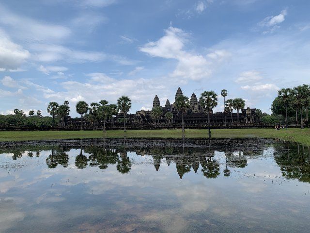 (220427) -- SIEM REAP, April 27, 2022 (Xinhua) -- Photo taken on April 5, 2022 shows the Angkor Wat Temple in the Angkor Archeological Park in Siem Reap province, Cambodia. China has been one of the key contributors to safeguarding, preserving and developing the famed Angkor Archaeological Park in northwest Cambodia\