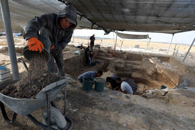 (220623) -- RAHAT (ISRAEL), June 23, 2022 (Xinhua) -- People work around the relics of a newly-discovered mosque in the southern Bedouin city of Rahat in the Negev desert, Israel, on June 23, 2022. Israeli archaeologists have discovered a rare rural mosque dated to over 1,200 years ago and a luxurious estate, the Israel Antiquities Authority (IAA) said on Wednesday. (Photo by Gil Cohen Magen\/Xinhua