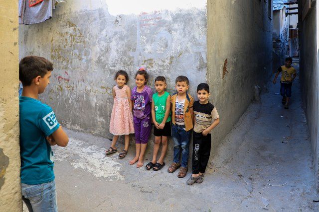 (220623) -- GAZA, June 23, 2022 (Xinhua) -- Children are seen in Jabalia refugee camp in northern Gaza Strip, on June 19, 2022. (Photo by Rizek Abdeljawad\/Xinhua) TO GO WITH Feature: Gazan refugees hope for better life amid harsh