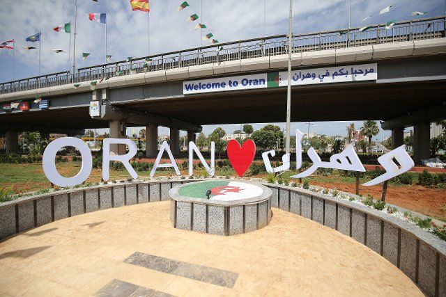 (220625) -- ORAN, June 25, 2022 (Xinhua) -- Photo taken on June 24, 2022 shows a welcome sign in Oran, Algeria. A total of 3390 athletes from 26 countries and regions will take part in the 19th Mediterranean Games scheduled from June 25 to July 6 in Oran, Algeria. (Xinhua