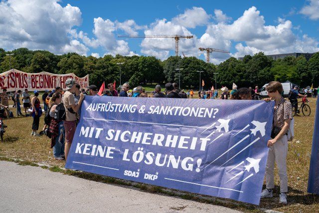 (220625) -- MUNICH, June 25, 2022 (Xinhua) -- People take part in a demonstration in Munich, Germany, on June 25, 2022 to protest against Group of Seven (G7) summit, which is to be held in Bavaria. (Xinhua\/Ren Ke