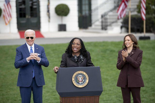 (220701) -- WASHINGTON, July 1, 2022 (Xinhua) -- File photo taken on April 8, 2022 shows Ketanji Brown Jackson (C), U.S. President Joe Biden (L) and Vice President Kamala Harris attending an event marking the Senate confirmation of Jackson for the Supreme Court at the South Lawn of the White House in Washington, D.C., the United States. Ketanji Brown Jackson was sworn in at noon on Thursday to formally become an associate justice of the U.S. Supreme Court, making her the nation\