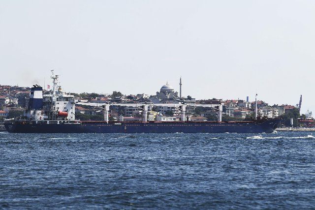 (220805) -- ISTANBUL, Aug. 5, 2022 (Xinhua) -- The first grain-laden ship Razoni passes by the Bosphorus Strait in Istanbul, T¨¹rkiye, Aug. 3, 2022. The first grain-laden ship leaving Ukraine passed through Istanbul\