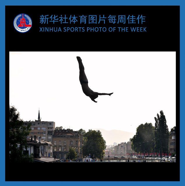 (220808) -- BEIJING, Aug. 8, 2022 (Xinhua) -- XINHUA SPORTS PHOTO OF THE WEEK (from Aug. 1 to Aug. 7, 2022) TRANSMITTED on Aug. 8, 2022. A man jumps into the water during the Bentbasa Cliff Diving Competition in Sarajevo, Bosnia and Herzegovina, on Aug. 6, 2022. (Photo by Nedim Grabovica\/Xinhua