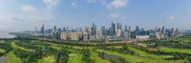 (220709) -- GUANGZHOU, July 9, 2022 (Xinhua) -- Aerial photo taken on March 27, 2020 shows the Nanshan District where many high-tech companies are located in Shenzhen, south China\