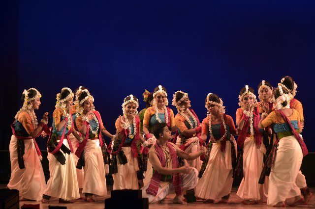 (221024) -- DHAKA, Oct. 24, 2022 (Xinhua) -- Artists perform on the stage during the drama dance "Chandalika" in Dhaka, Bangladesh, Oct. 23, 2022. The auditorium of Bangladesh Shilpakala Academy in Dhaka teemed with spectators on Sunday as dance drama based on the popular story "Chandalika" by 1913 Nobel laureate in literature Rabindranath Tagore was staged as part of an ongoing cultural festival. TO GO WITH Dance drama of Tagore\