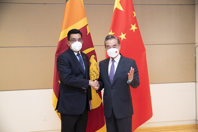(220924) -- NEW YORK, Sept. 24, 2022 (Xinhua) -- Chinese State Councilor and Foreign Minister Wang Yi (R) meets with Sri Lankan Minister of Foreign Affairs Mohamed Ali Sabry on the sidelines of the ongoing 77th session of the United Nations General Assembly in New York, the United States, Sept. 23, 2022. (Xinhua\/Wang Ying