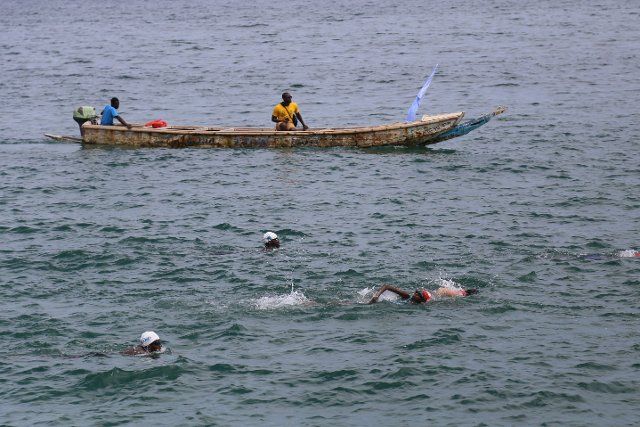 (220926) -- DAKAR, Sept. 26, 2022 (Xinhua) -- Competitors swim during the 33rd Dakar-Goree Island Cross-Sea Swimming Competition in Dakar, capital of Senegal, on Sept. 25, 2022. The Dakar-Goree Swim is an annual open water swimming event between the beach of Dakar and Goree island. (Xinhua\/Wang Zizheng