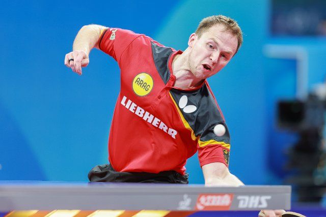 (220930) -- CHENGDU, Sept. 30, 2022 (Xinhua) -- Benedikt Duda of Germany hits a return against Kirill Gerassimenko of Kazakhstan during the men\
