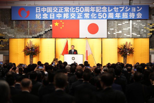 (220930) -- TOKYO, Sept. 30, 2022 (Xinhua) -- Chinese Ambassador to Japan Kong Xuanyou addresses a reception marking the 50th anniversary of the normalization of China-Japan diplomatic relations in Tokyo, Japan, Sept. 29, 2022. More than 850 people from the Japanese business community and Japanese and Chinese friendly personnel attended the reception, where photos and documentaries reviewing the 50 years of the normalization of China-Japan ties were exhibited. (Xinhua\/Zhang Xiaoyu