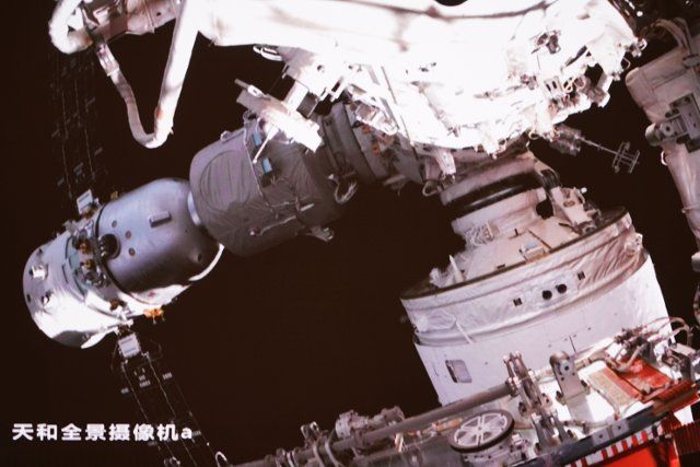 (220930) -- BEIJING, Sept. 30, 2022 (Xinhua) -- Screen image captured at Beijing Aerospace Control Center on Sept. 30, 2022 shows the Wentian lab module completing transposition and docking with the side port of the space station\