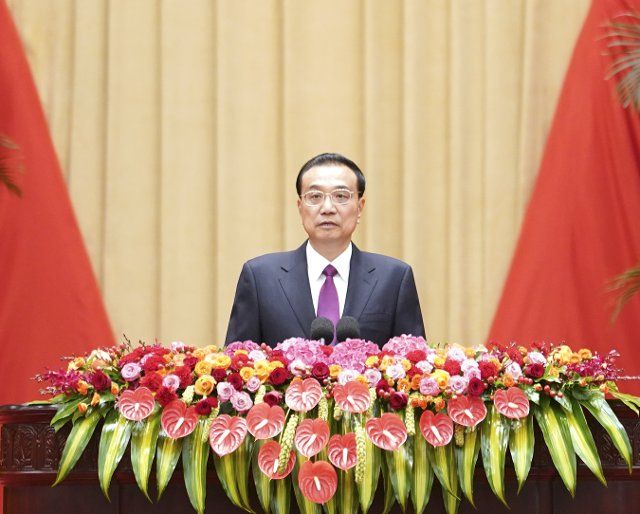 (220930) -- BEIJING, Sept. 30, 2022 (Xinhua) -- Chinese Premier Li Keqiang addresses a reception held by the State Council to celebrate the 73rd anniversary of the founding of the People\