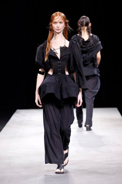 (221001) -- PARIS , Oct. 1, 2022 (Xinhua) -- Models present creations from the Spring\/Summer 2023 Ready-to-Wear collection of Yohji Yamamoto during the Paris Fashion Week, in Paris, France, Sept. 30, 2022. (Photo by Piero Biasion\/Xinhua