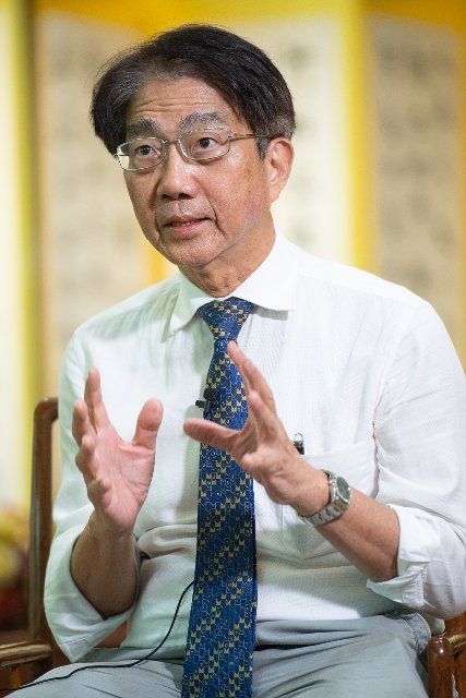 (221004) -- MACAO, Oct. 4, 2022 (Xinhua) -- Joseph Hun-wei Lee, president of the Macao University of Science and Technology (MUST), reacts during an interview with Xinhua in Macao, south China, Oct. 4, 2022. TO GO WITH "Interview: Payload specialist selection significant to Macao\