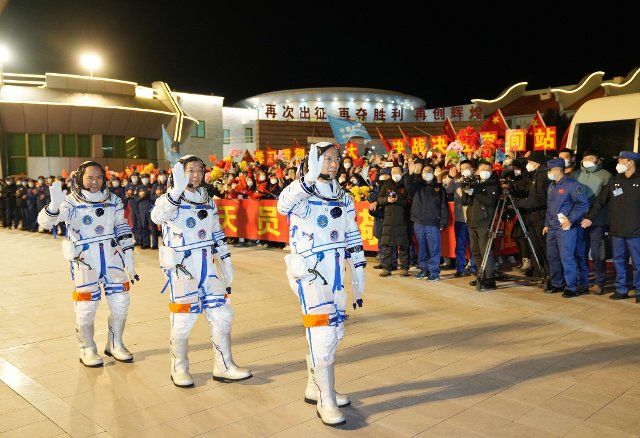 (221129) -- JIUQUAN, Nov. 29, 2022 (Xinhua) -- A see-off ceremony for three Chinese astronauts of the Shenzhou-15 manned space mission is held at the Jiuquan Satellite Launch Center in northwest China, Nov. 29, 2022. Astronauts Fei Junlong (front), Deng Qingming (C), and Zhang Lu have received years of arduous training for this six-month mission, during which the construction of China\