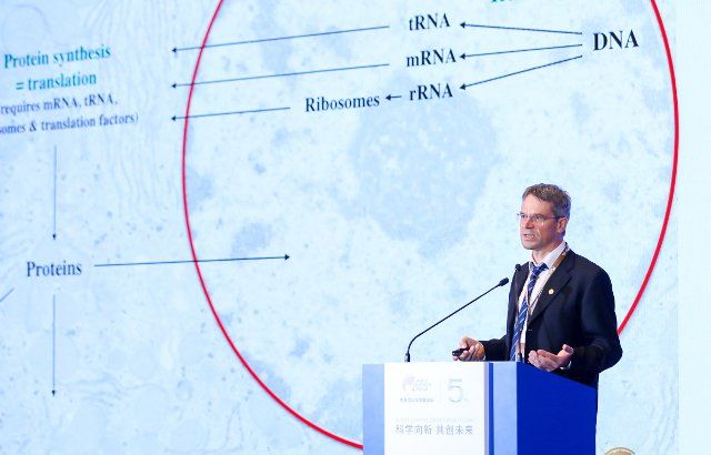 (221107) -- SHANGHAI, Nov. 7, 2022 (Xinhua) -- German biochemist Dirk Gorlich, winner of the 2022 World Laureates Association (WLA) Prize in Life Science or Medicine, addresses the opening ceremony at the 5th World Laureates Forum in Shanghai, east China, Nov. 6, 2022. The 5th World Laureates Forum kicked off Sunday in Shanghai, gathering 60 decorated scientists, including 27 Nobel Prize winners, at the two-day event online and offline. (Xinhua