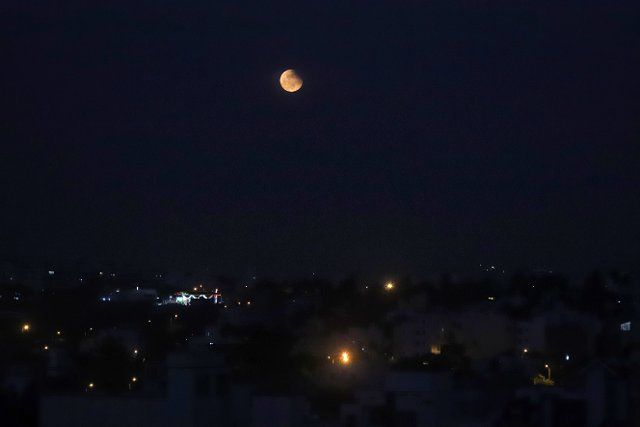 (221109) -- BANGALORE, Nov. 9, 2022 (Xinhua) -- The moon is seen during a lunar eclipse in Bangalore, India, Nov. 8, 2022. (Str\/Xinhua