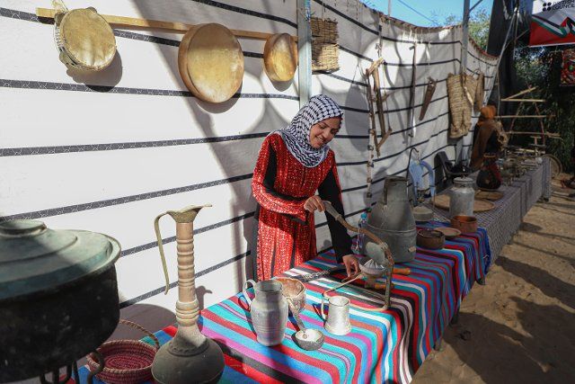 (221130) -- GAZA, Nov. 30, 2022 (Xinhua) -- A Palestinian woman takes part in an exhibition of archaeological and heritage artifacts at the archaeological site of the Saint Hilarion Monastery in the central Gaza Strip, on Nov. 30, 2022. (Photo by Rizek Abdeljawad\/Xinhua
